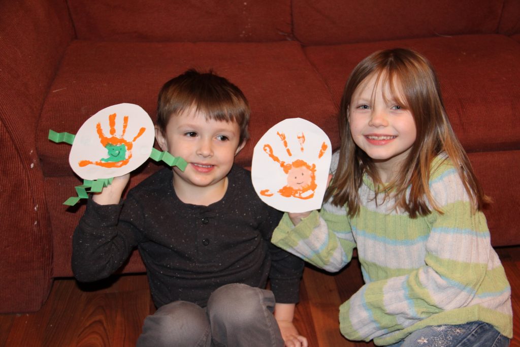 Create a simple handprint Leprechaun craft for kids. It is a perfect last minute St. Patrick's Day craft for kids that they will have fun playing with.