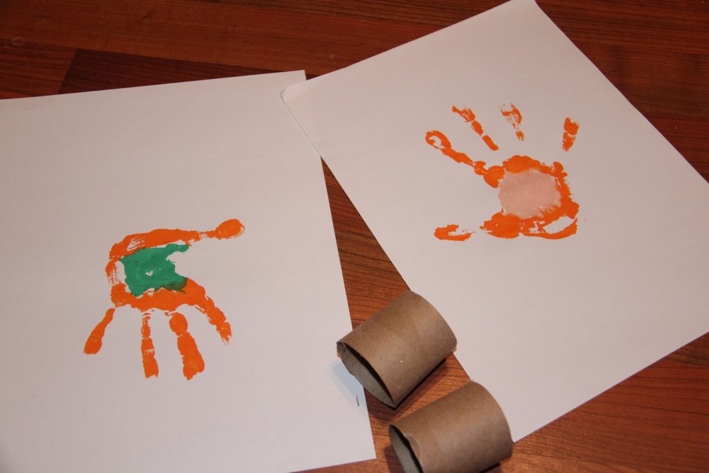 Create a simple handprint Leprechaun craft for kids. It is a perfect last minute St. Patrick's Day craft for kids that they will have fun playing with.