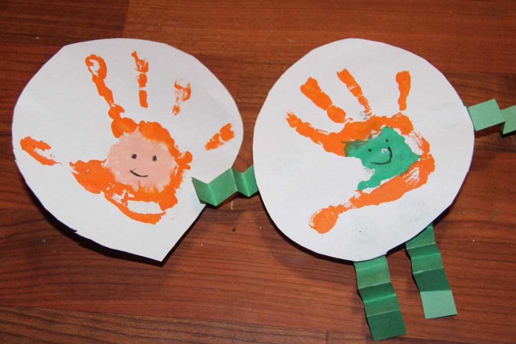 Create a simple handprint Leprechaun craft for kids. It is a perfect last minute St. Patrick's Day craft for kids that they will have fun playing with.