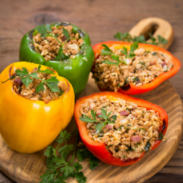 healthy stuffed peppers on a cutting board