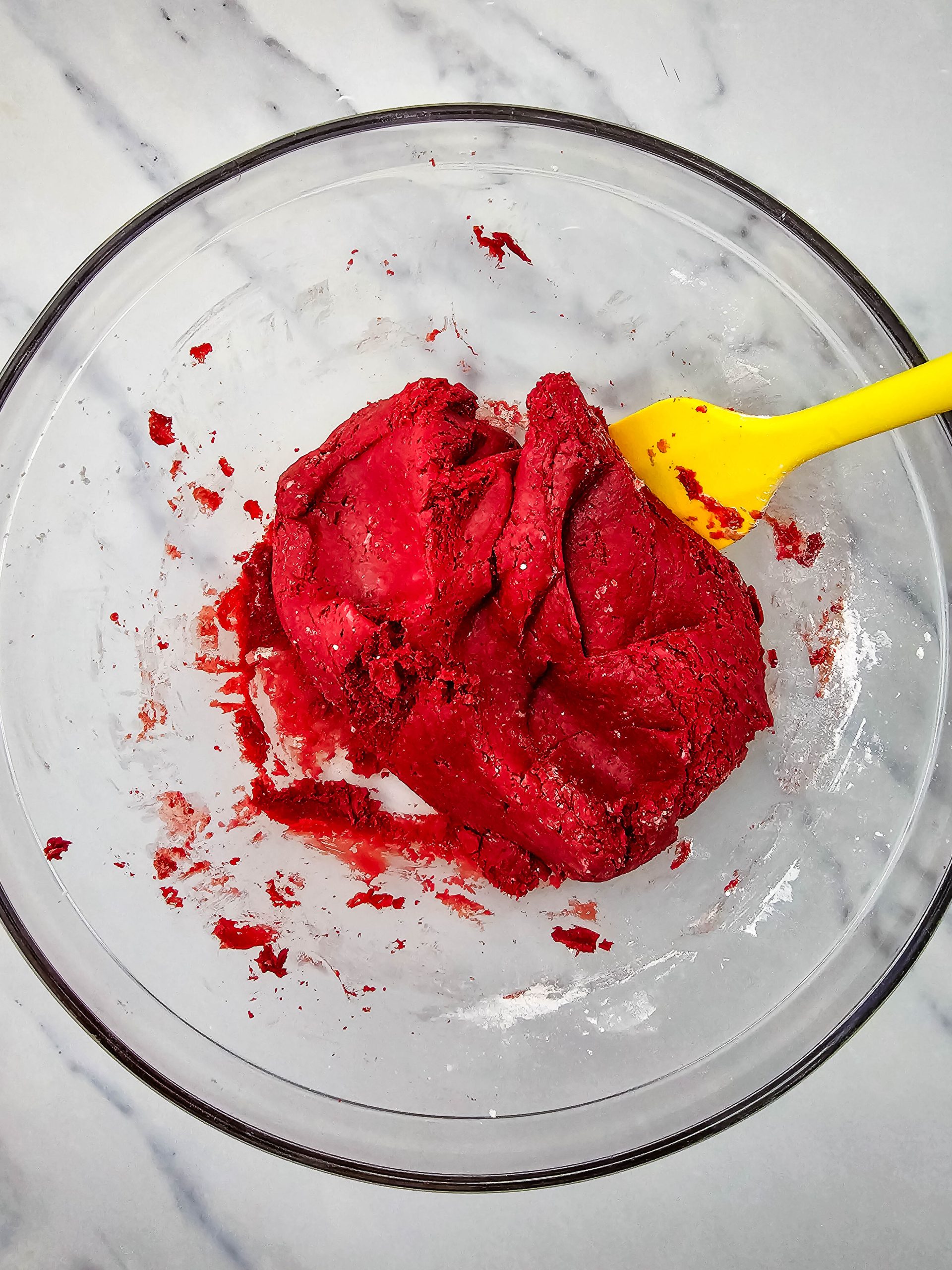 red velvet fudge batter in a clear bowl