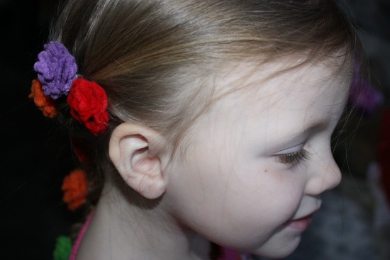 Getting the Disney's Tangled Braid Flowers in her hair