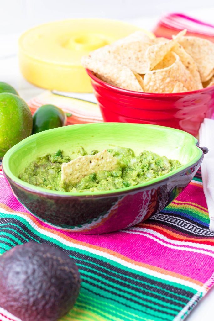 guacamole recipe in a green bowl