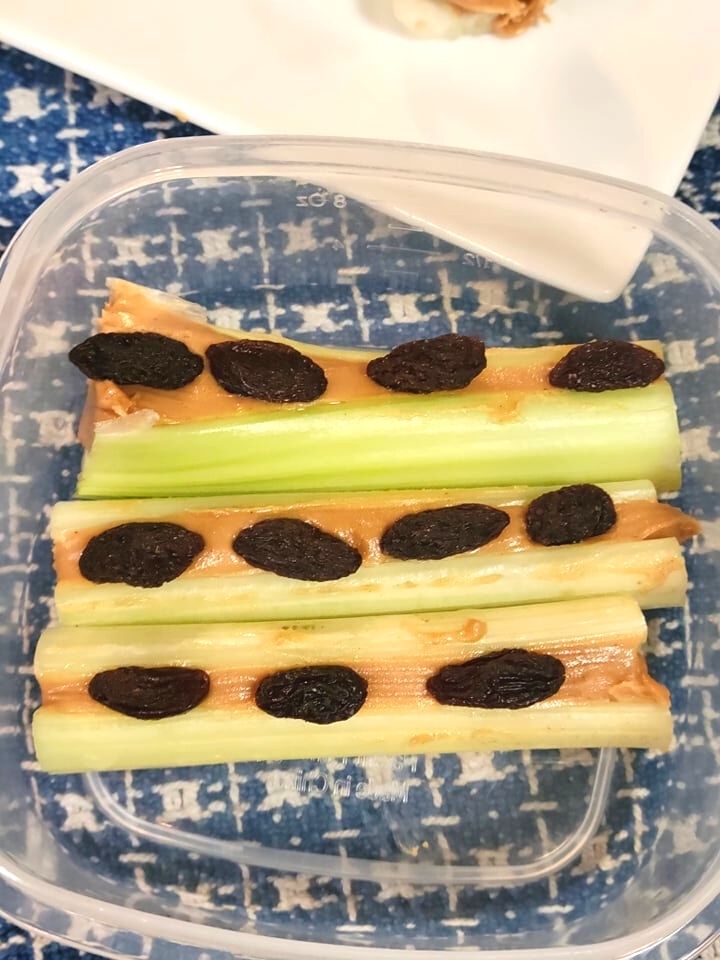 celery snack in a lunch box container