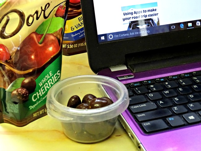 Homemade frozen yogurt and chocolate covered cherries as a snack