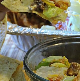 Looking for a recipe to take to your next picnic, potluck or party? Taco Dip is always a hit. Simple to make and taste delicious, everyone will want it. #taco #picnic #recipe