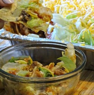 Looking for a recipe to take to your next picnic, potluck or party? Taco Dip is always a hit. Simple to make and taste delicious, everyone will want it.
