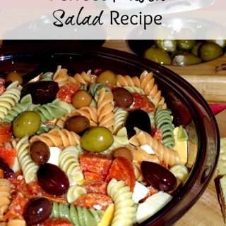 Looking for a picnic recipe that everyone will love? This potluck pasta salad recipe is perfect for an easy dinner recipe, or for a get together.