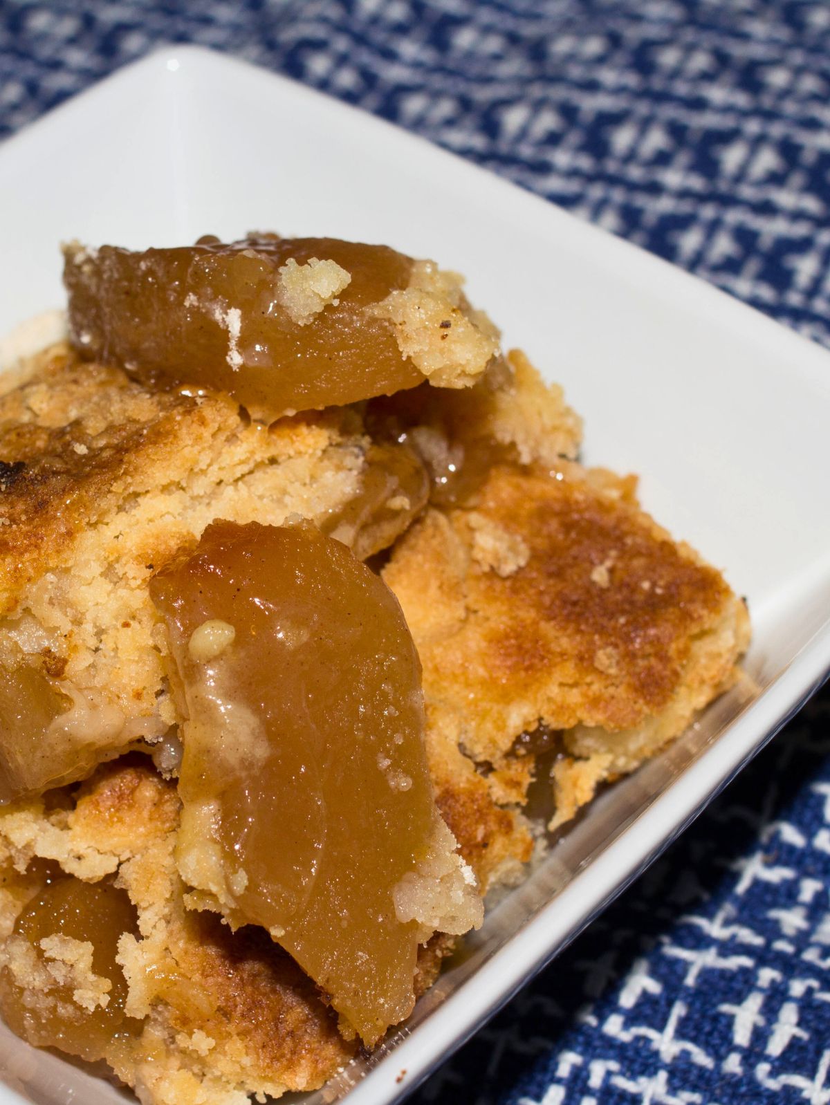 apple cobbler in a white bowl