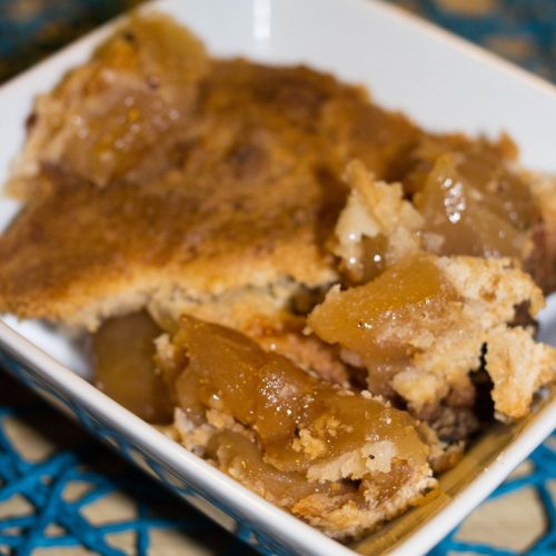 cake mix apple cobbler in a white bowl