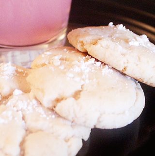 Pink Lemonade Cookies are the perfect treat! Sugar cookies with a light lemony taste. Wonderful with a glass of tea or lemonade, perfect for a small snack or after dinner treat.
