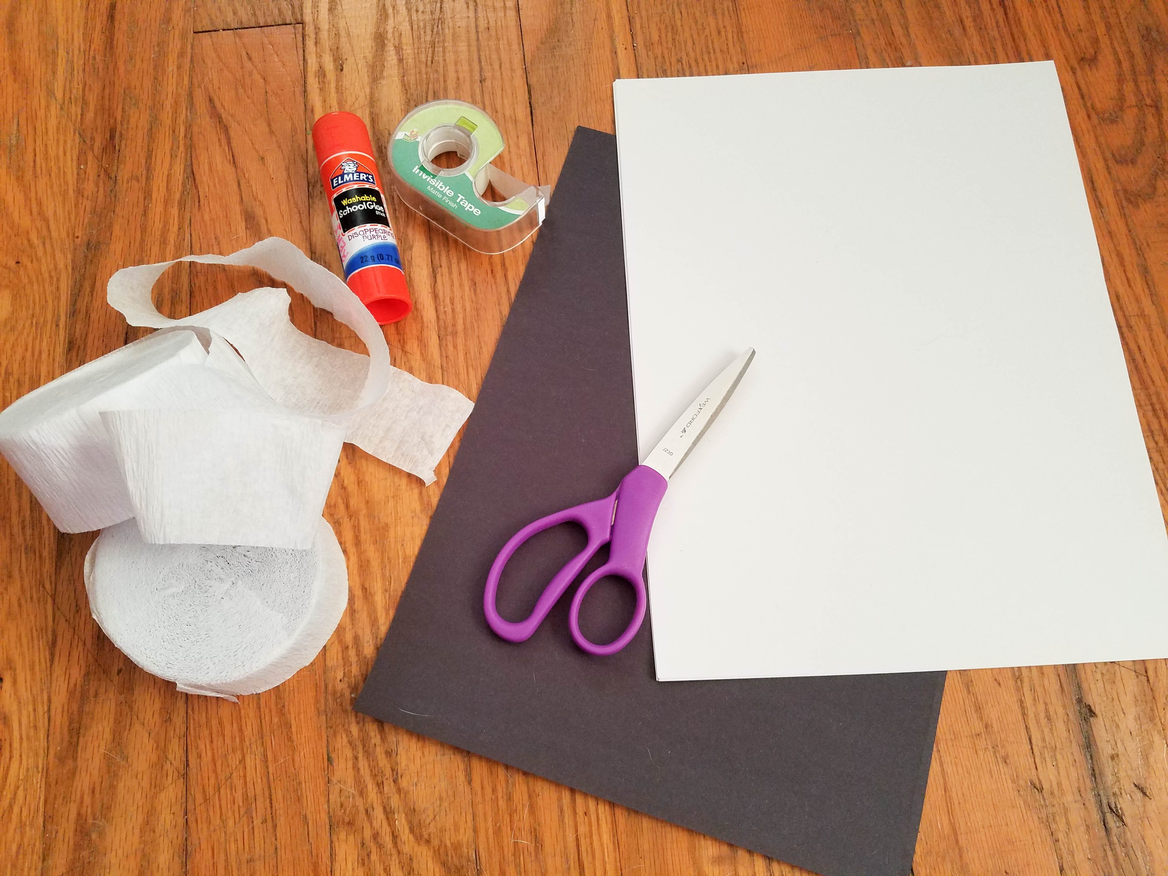 Create this mummy Halloween door decoration with only a few supplies. It is a simple diy Halloween decoration that costs next to nothing and is simple to make