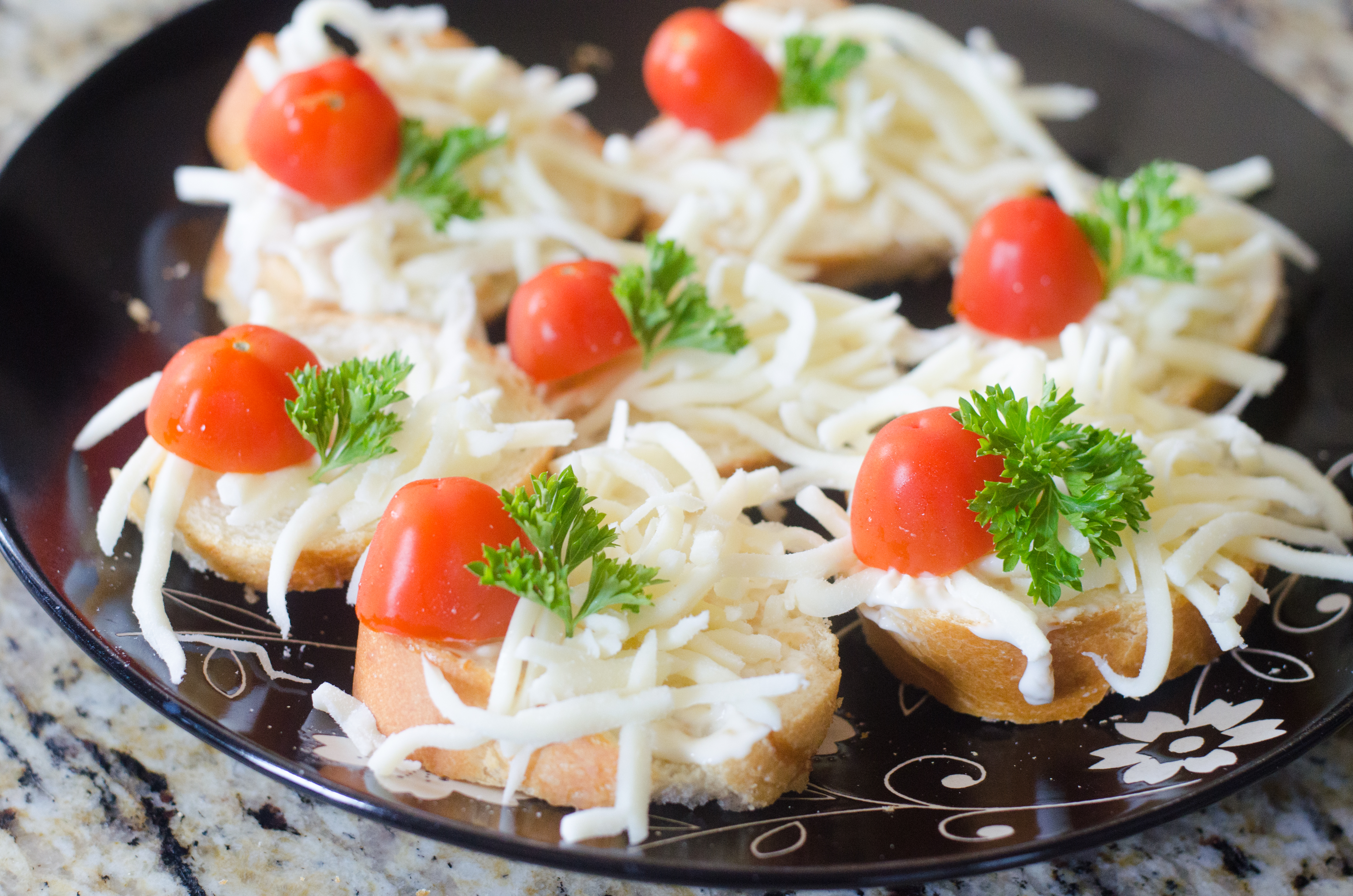 Need a simple appetizer for your next get together? This Parmesan topped appetizer is too good not to serve your friends and family. 