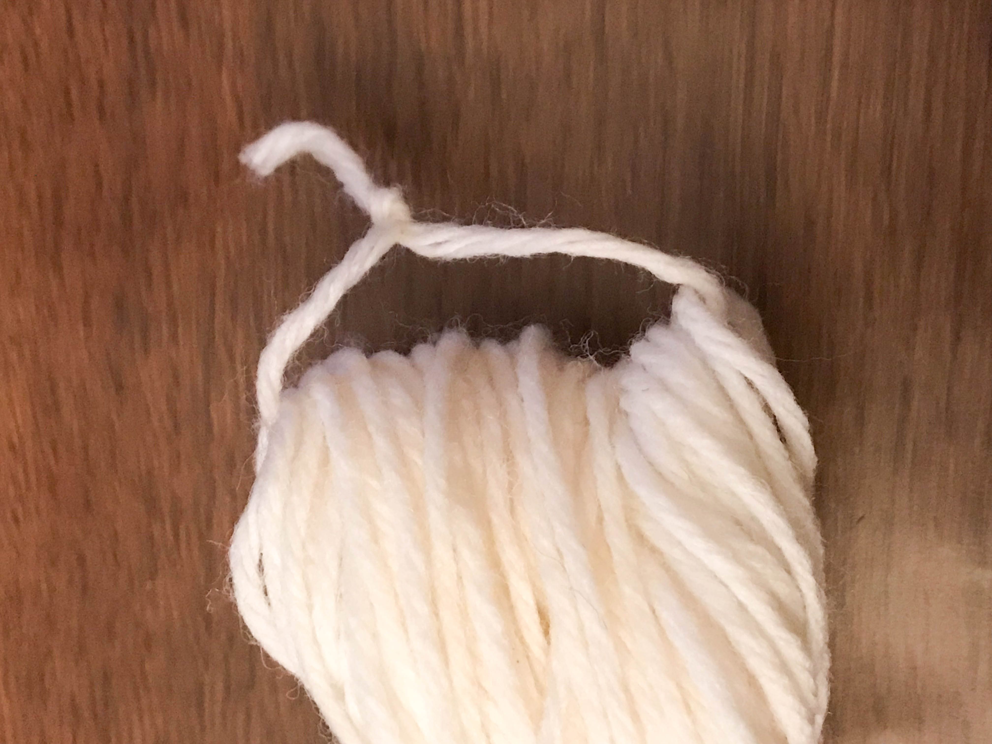 yarn wrapped with string