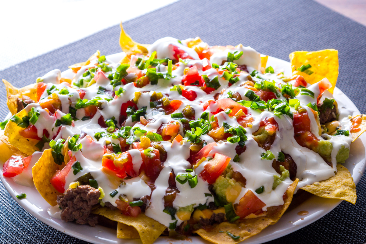 nachos on a white plate