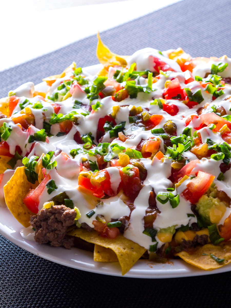 nachos on a white plate