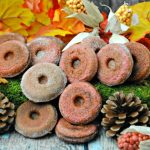 Apple Cider Donut Ingredients: 4 TBSP unsalted butter, melted and cooled ½ c apple cider 1 C flour 1 tsp baking powder ½ tsp cinnamon ¼ tsp nutmeg ¼ tsp salt ⅓ C sugar 1 egg, room temp These donuts are a delicious twist on an apple recipe. Using Apple Cider, the taste of these Apple Cider donuts is amazing. Making the donuts: Preheat oven to 425 degrees. In a double boiler, melt the butter. Remove from heat and stir in the apple cider. Set this aside. Add all of your flour, baking powder, nutmeg, and salt in a bowl, mix well. Transfer the butter mixture to a bowl, whisk in sugar and the egg, lightly beaten. When completely mixed together slowly begin to add this mixture (the wet mixture) to the flour bowl. Don't over stir, just ensure that all of your ingredients are well blended. Spray the mini donut pan with baking spray. Spoon in the batter until each is filled ½ way. Bake at 425 degrees for 5-6 minutes and springs back with a slight touch. Add the sugar and cinnamon in a bowl, stirring to mix, then pour into a clean salt shaker. While the donuts are still warm shake the sugar/cinnamon on each donut. Once slightly cooled remove from the donut pan placing on a wire rack to cool completely.