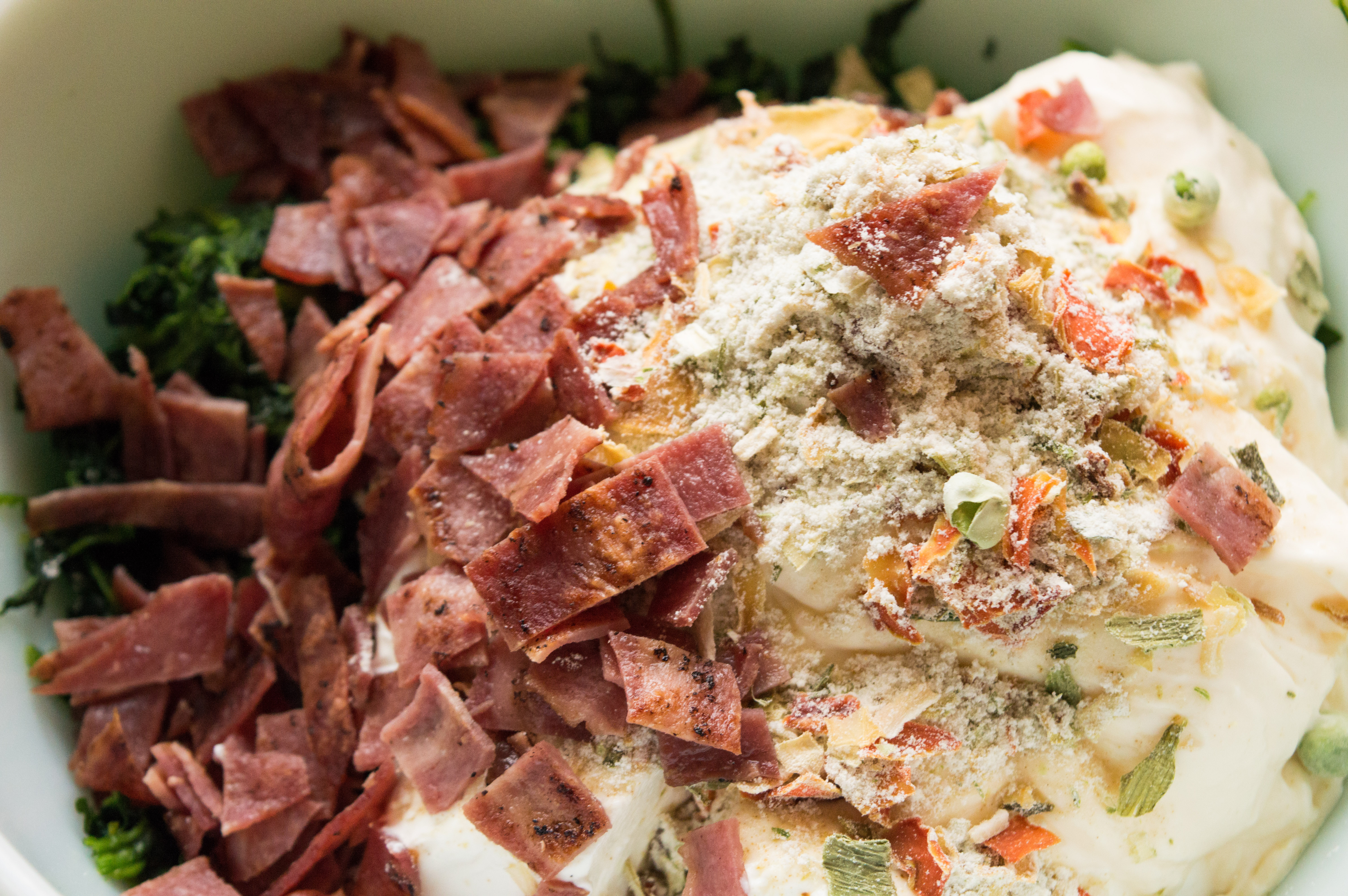 Love spinach dip? So do I. This spinach dip recipe, an easy pot luck recipe, will leave you craving more once you add my special ingredient. Bacon! 