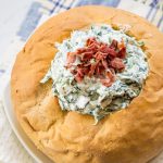 Love spinach dip? So do I. This spinach dip recipe, an easy pot luck recipe, will leave you craving more once you add my special ingredient. Bacon!