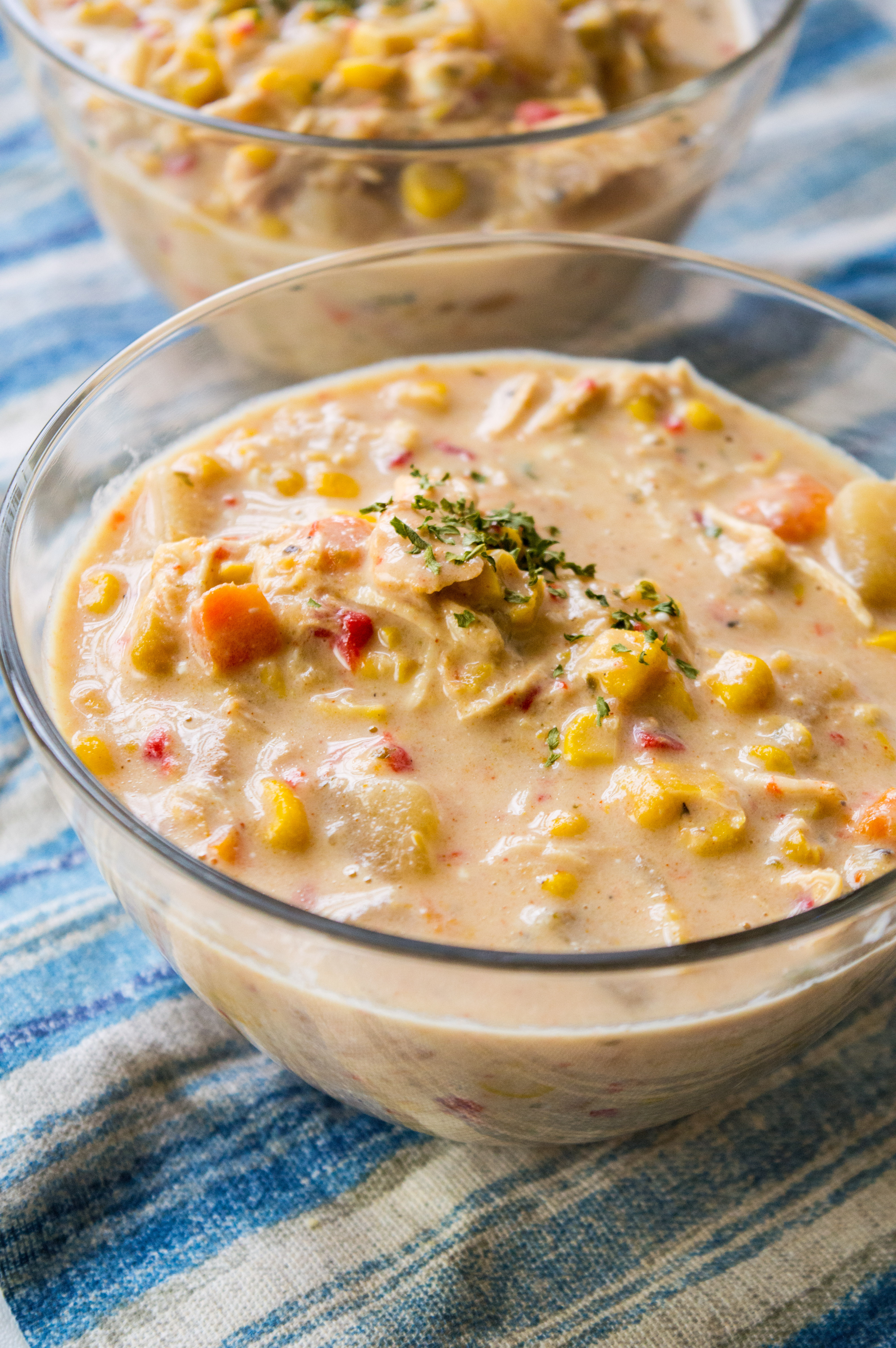 Looking for a chicken corn chowder recipe? This slow cooker soup is a copy cat recipe of WAWAs chicken corn chowder and it is soup heaven. 