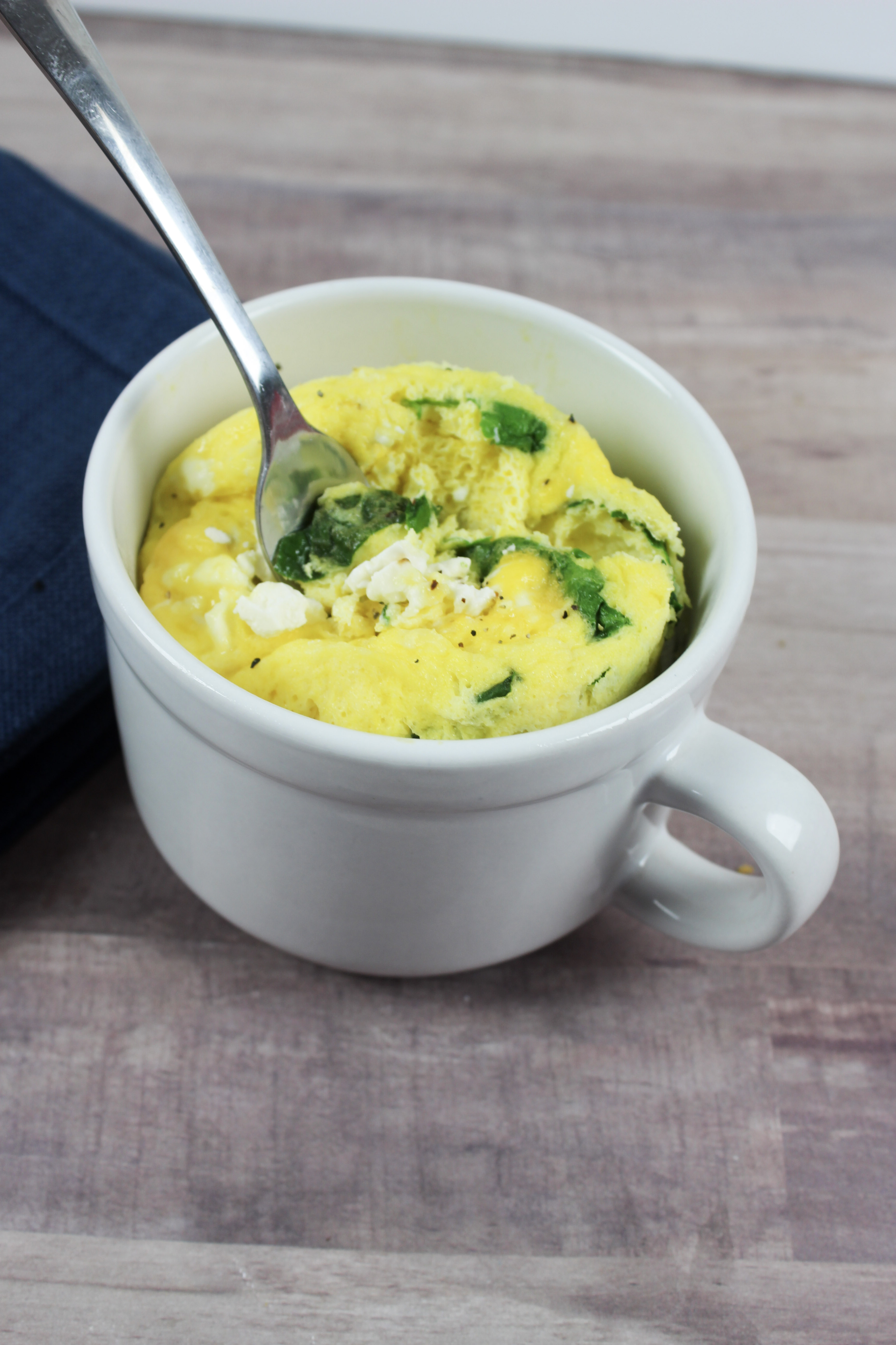 Breakfast is very important. Mornings are hard when you are short on time. Omelette in a mug is a quick breakfast idea. Spinach & feta omelette in a mug