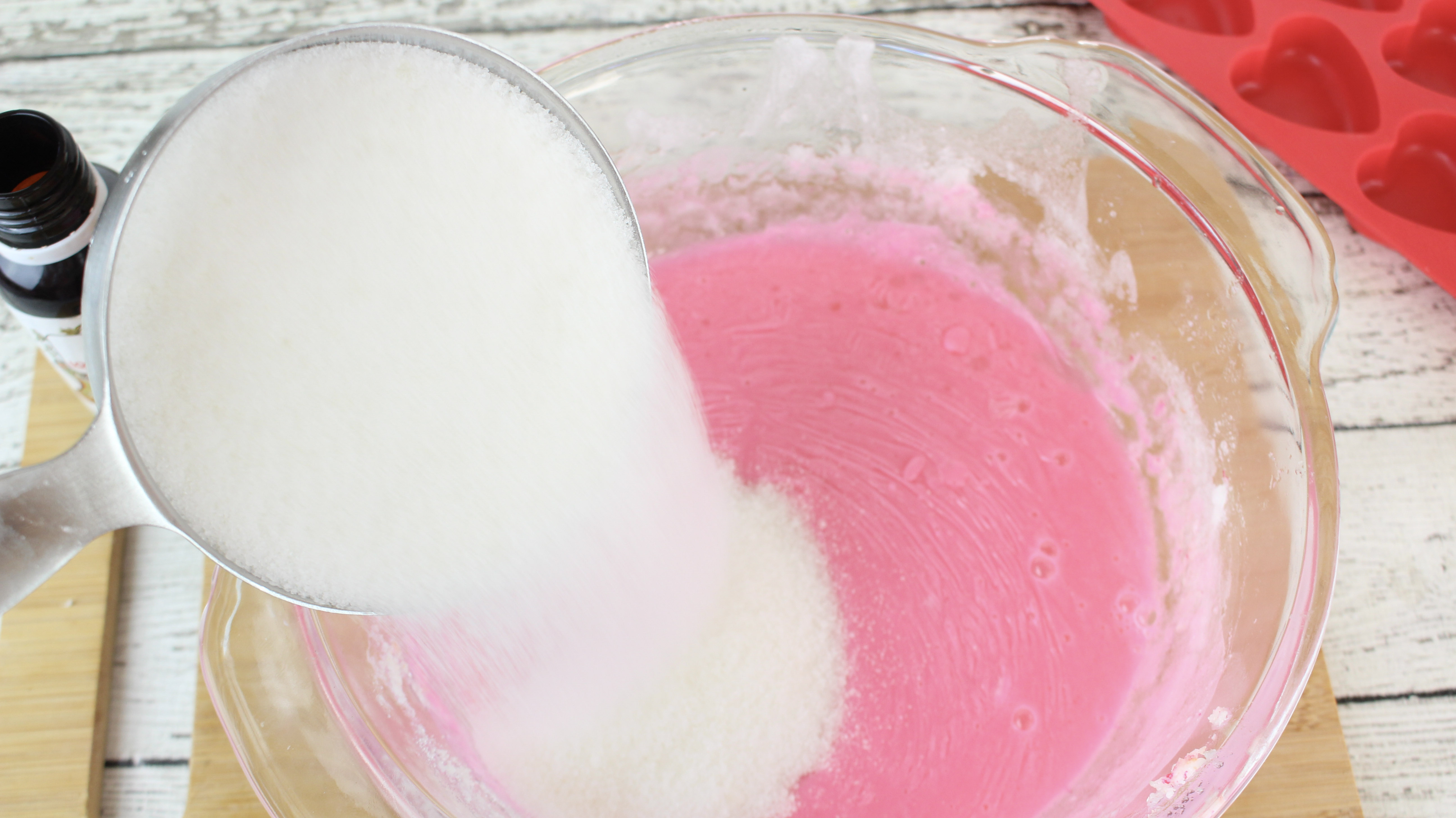 Add in sugar to the soap mixture to make Rose Vanilla Exfoliating Sugar Scrub Soap Cubes