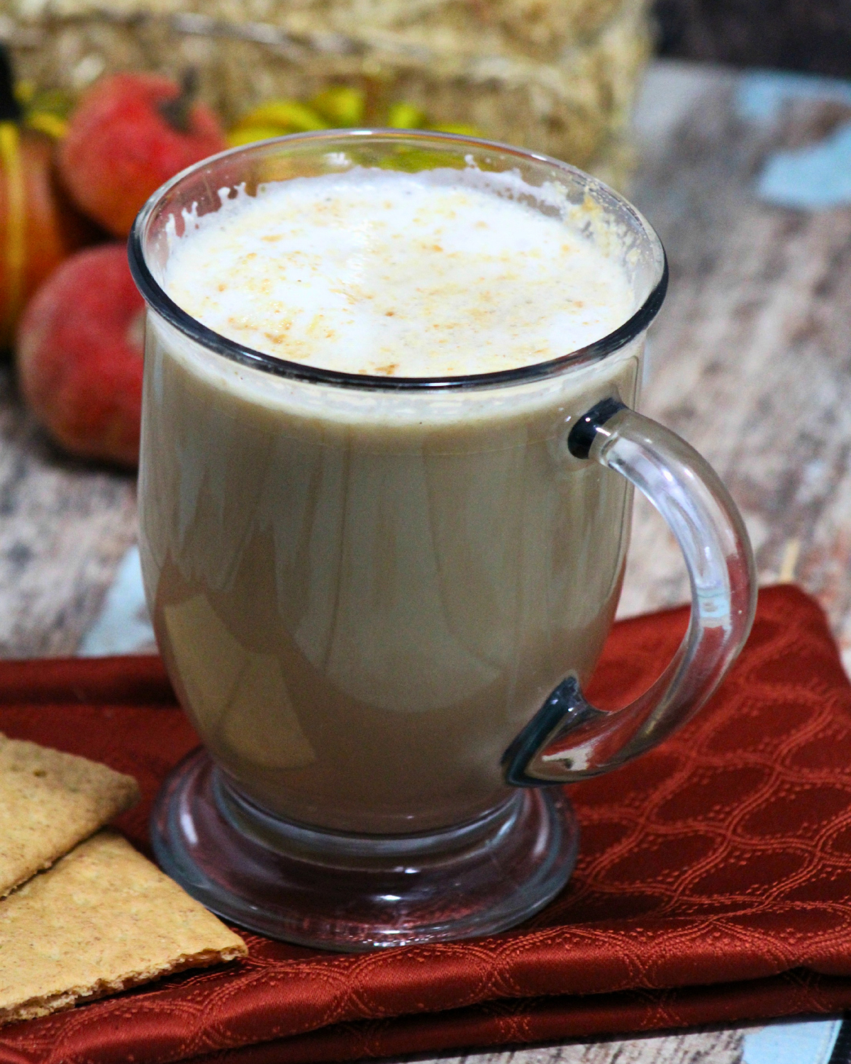Copycat Starbucks Graham Cracker Latte recipe graphic featuring a frothy coffee topped with crushed graham crackers and recipe title.