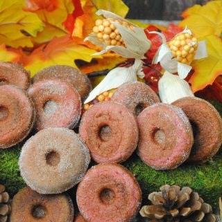 Apple Cider Donut Ingredients: 4 TBSP unsalted butter, melted and cooled ½ c apple cider 1 C flour 1 tsp baking powder ½ tsp cinnamon ¼ tsp nutmeg ¼ tsp salt ⅓ C sugar 1 egg, room temp These donuts are a delicious twist on an apple recipe. Using Apple Cider, the taste of these Apple Cider donuts is amazing. Making the donuts: Preheat oven to 425 degrees. In a double boiler, melt the butter. Remove from heat and stir in the apple cider. Set this aside. Add all of your flour, baking powder, nutmeg, and salt in a bowl, mix well. Transfer the butter mixture to a bowl, whisk in sugar and the egg, lightly beaten. When completely mixed together slowly begin to add this mixture (the wet mixture) to the flour bowl. Don't over stir, just ensure that all of your ingredients are well blended. Spray the mini donut pan with baking spray. Spoon in the batter until each is filled ½ way. Bake at 425 degrees for 5-6 minutes and springs back with a slight touch. Add the sugar and cinnamon in a bowl, stirring to mix, then pour into a clean salt shaker. While the donuts are still warm shake the sugar/cinnamon on each donut. Once slightly cooled remove from the donut pan placing on a wire rack to cool completely.