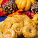 Looking for a delicious pumpkin donut recipe? These baked mini donuts are the perfect sized pumpkin treat. Filled with pumpkin spice flavor, these donuts are glazed to perfection. #pumpkin #treat #breakfast #donuts