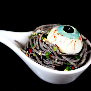 Looking for Halloween Part food ideas? This Halloween Spaghetti with Deviled Eyes is great for Halloween party food for kids or for Halloween Party food for adults. #Halloween #Recipe #PartyFood #