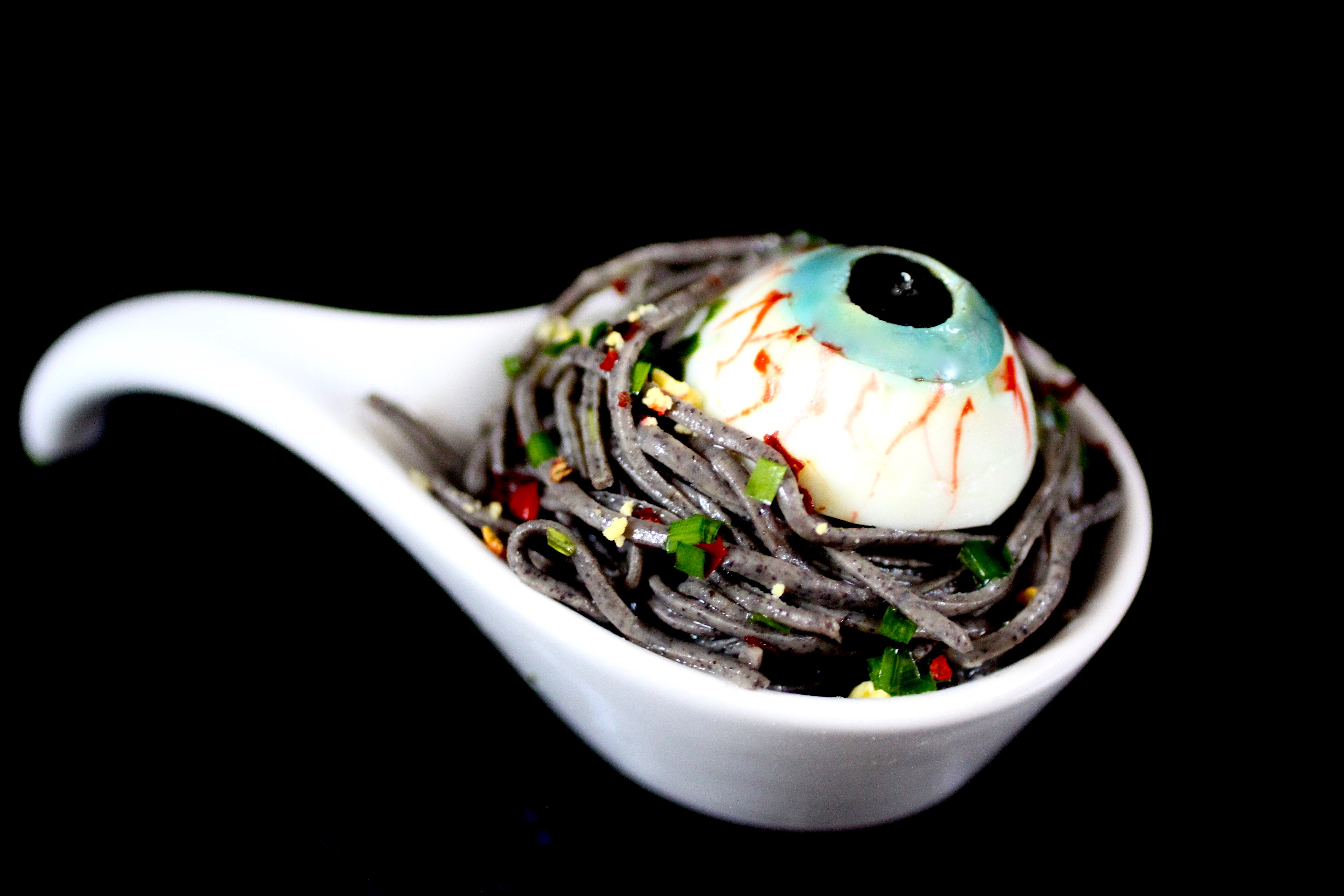 Looking for Halloween Part food ideas? This Halloween Spaghetti with Deviled Eyes is great for Halloween party food for kids or for Halloween Party food for adults. #Halloween #Recipe #PartyFood #