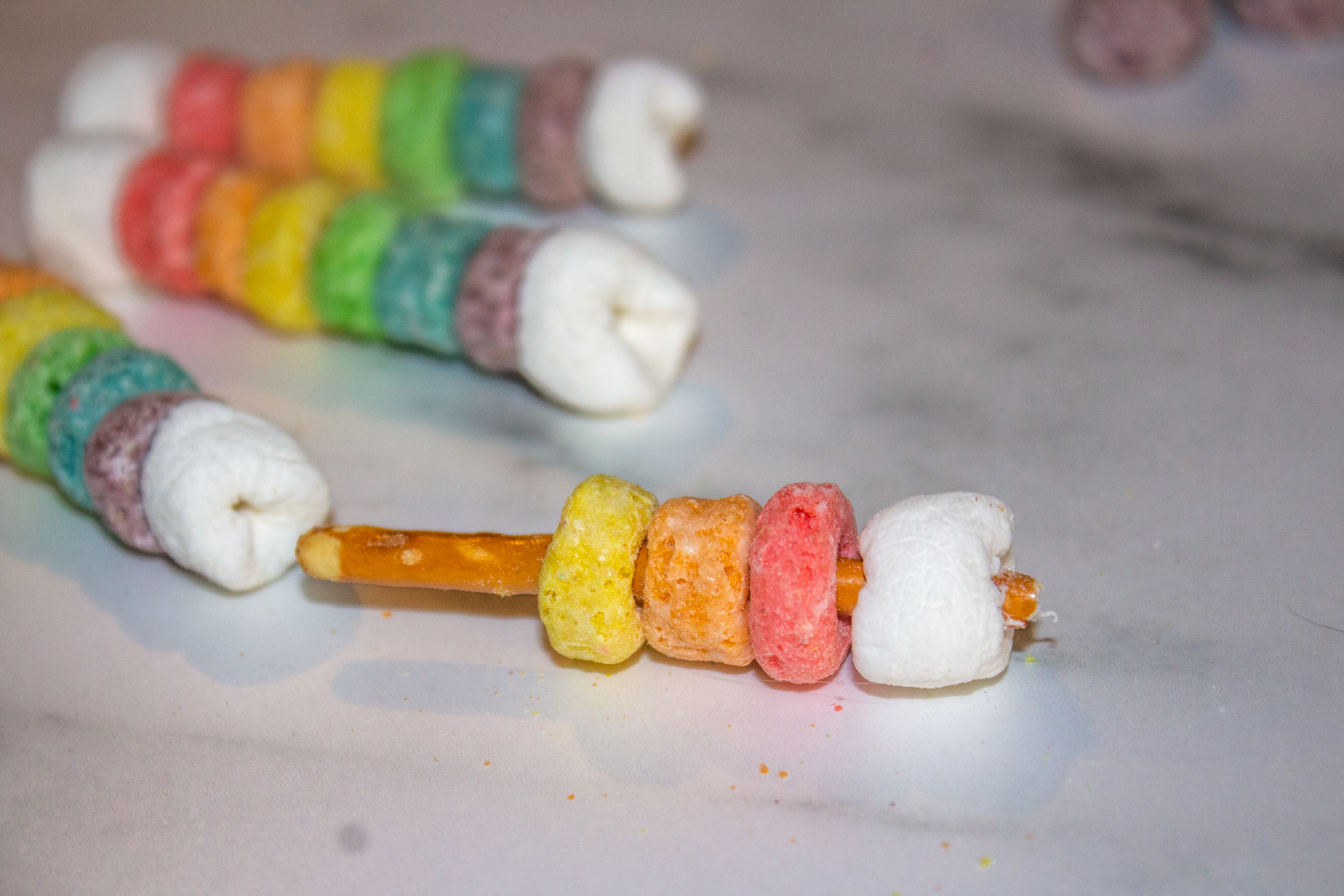 the making of rainbow on a stick