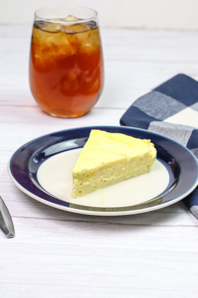 0 point cheesecake on a white and blue plate