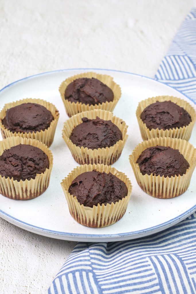 weight watchers chocolate pumpkin muffins on a white plate