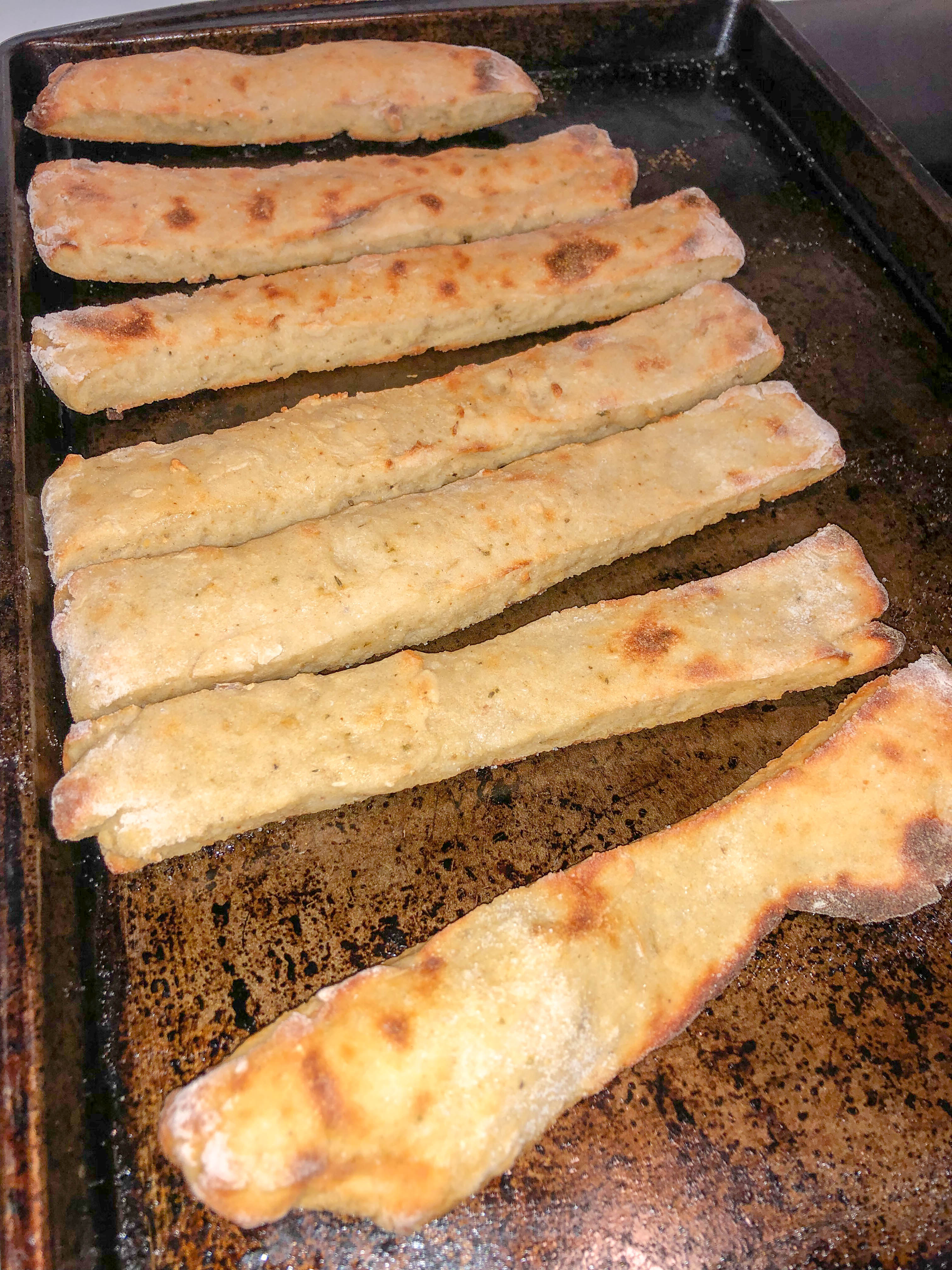 2 ingredient dough breadsticks on a cookie sheet