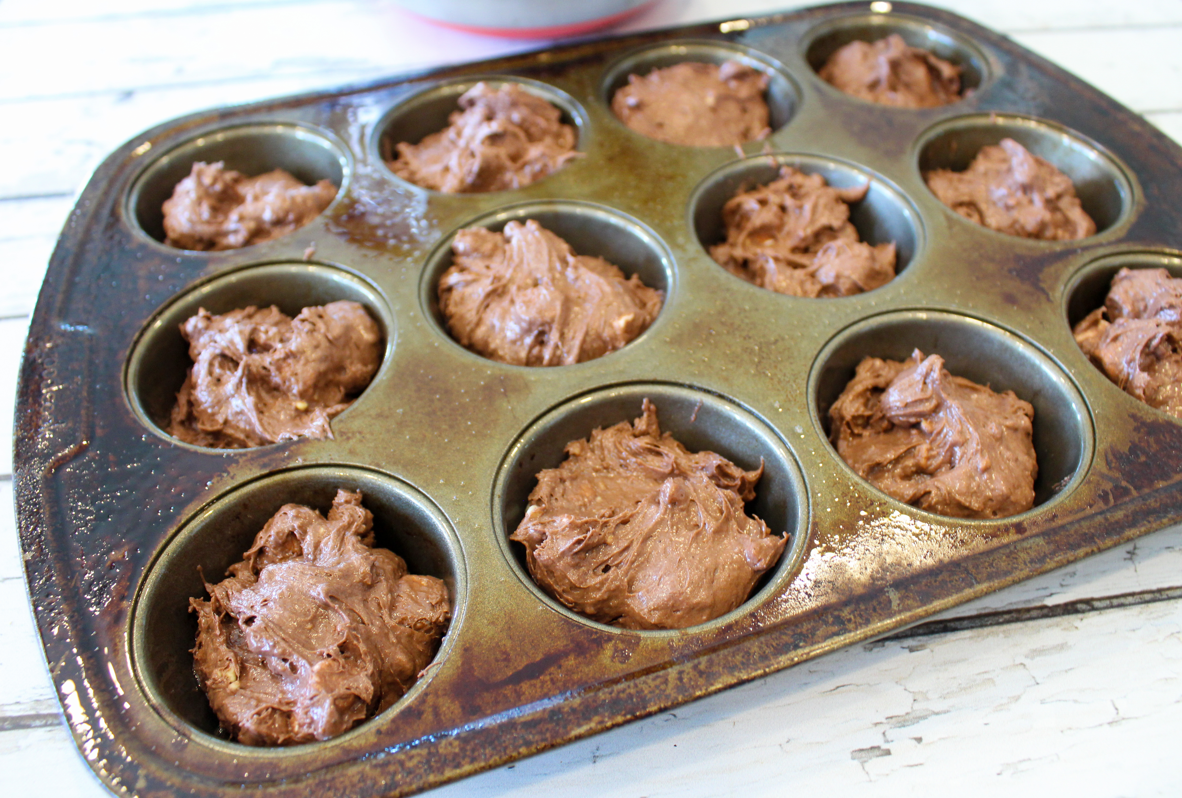 rocky road cupcake batter in the muffin tin