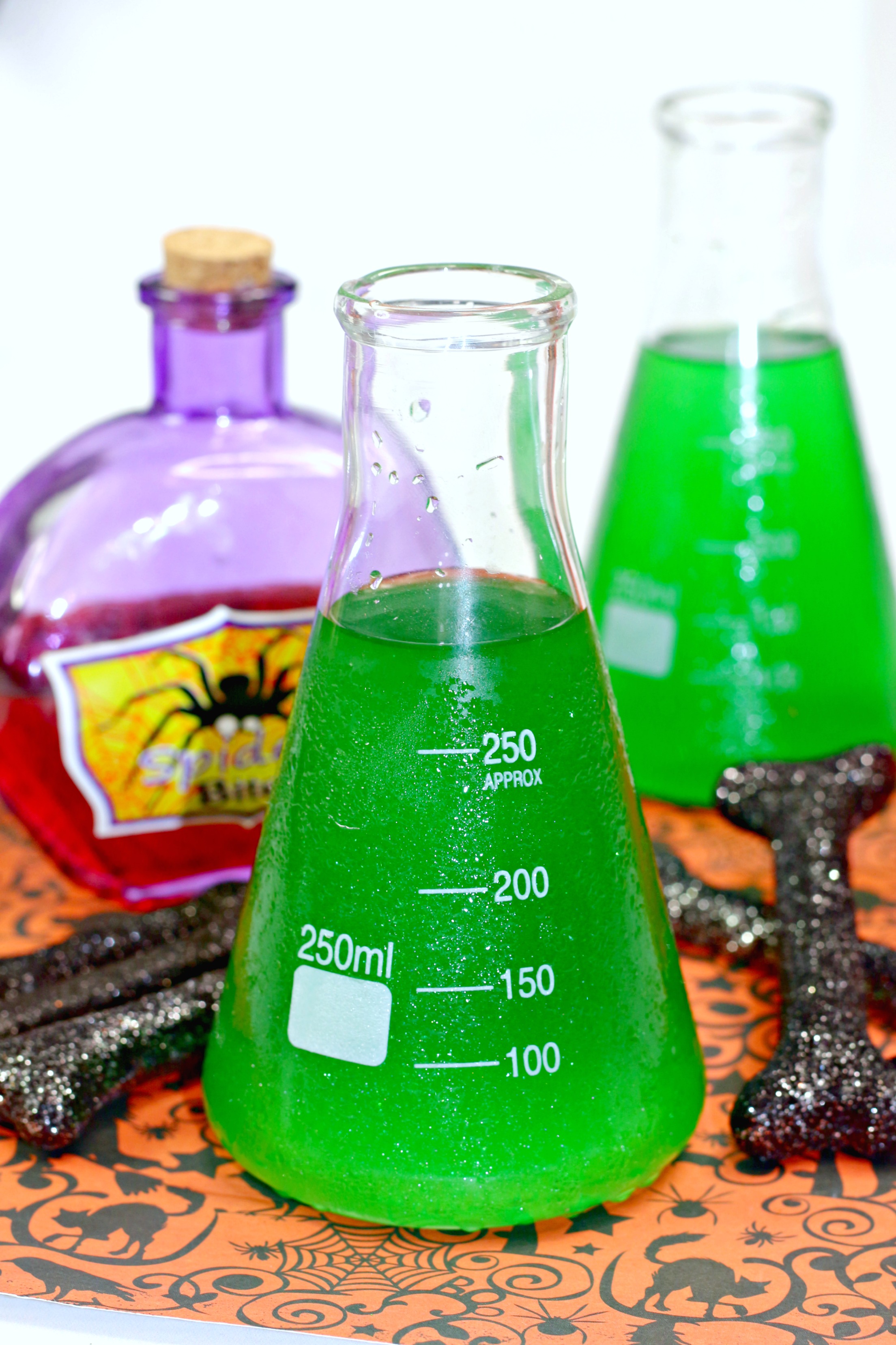 Halloween alcoholic punch served in a science flask