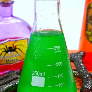 Halloween alcoholic punch served in a science flask