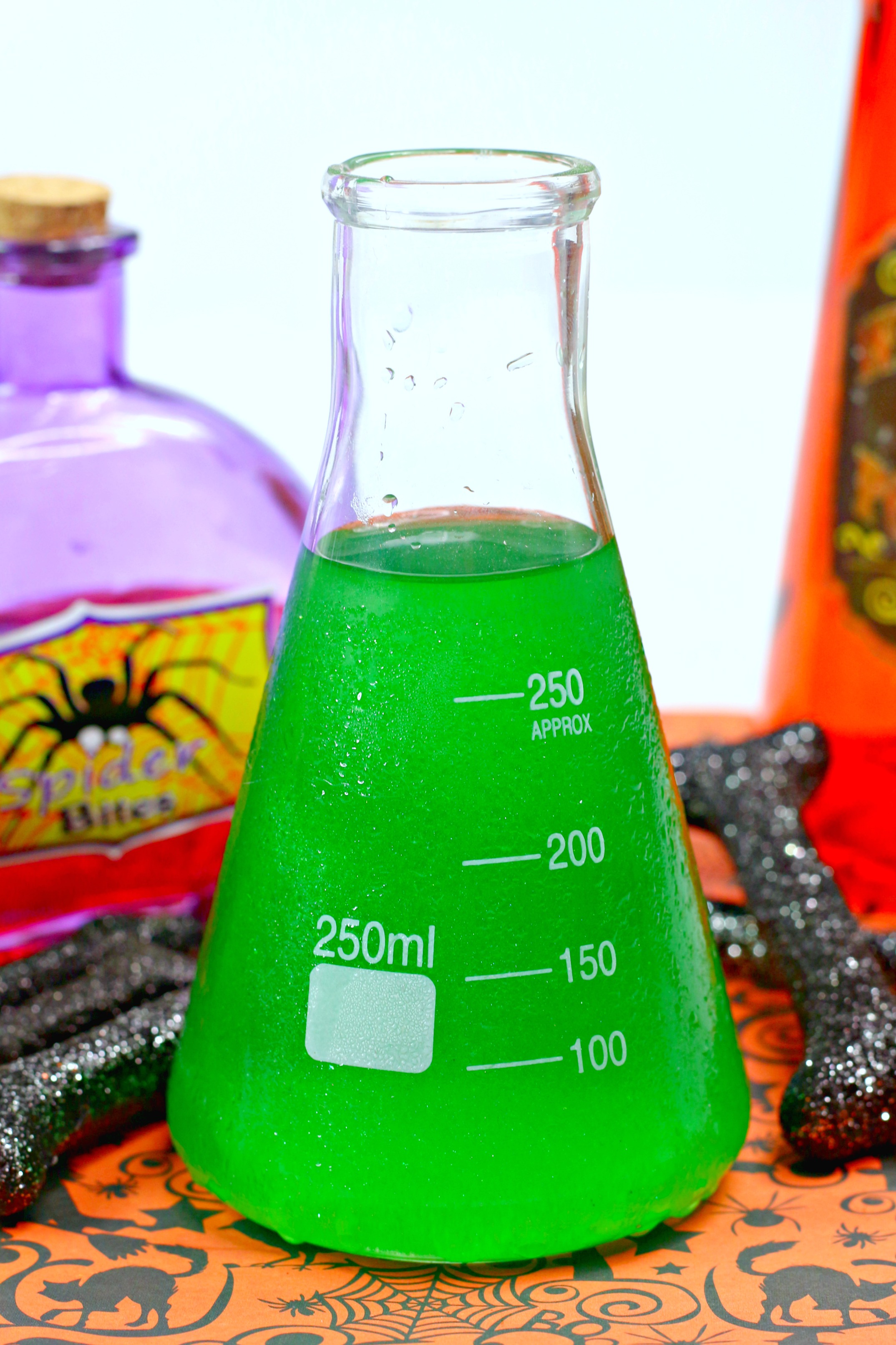 Halloween alcoholic punch served in a science flask