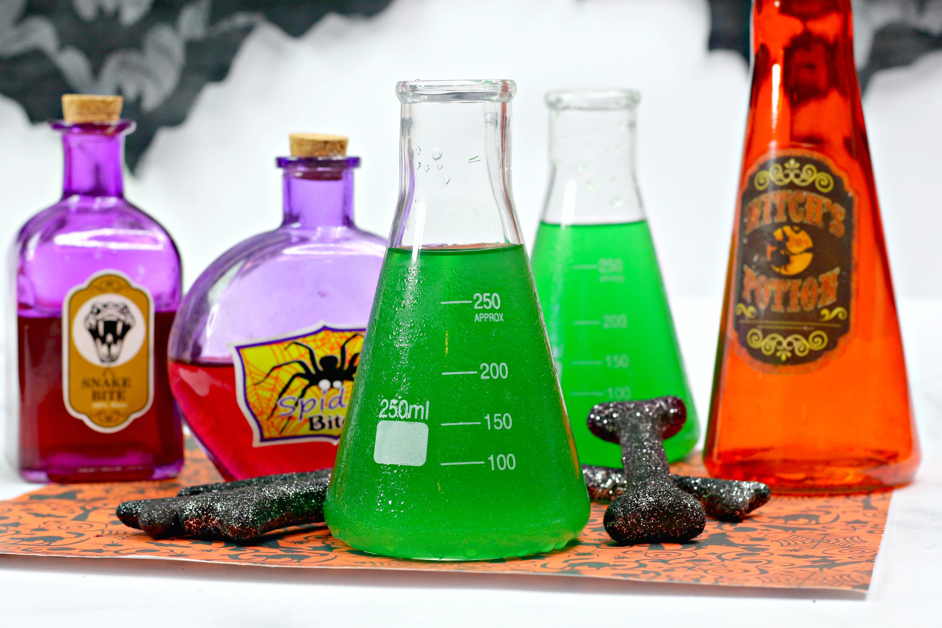 Halloween alcoholic punch served in a science flask