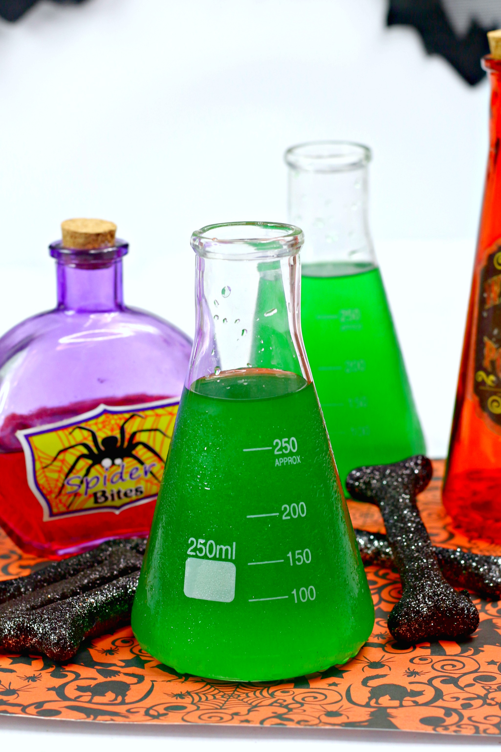 Halloween alcoholic punch served in a science flask