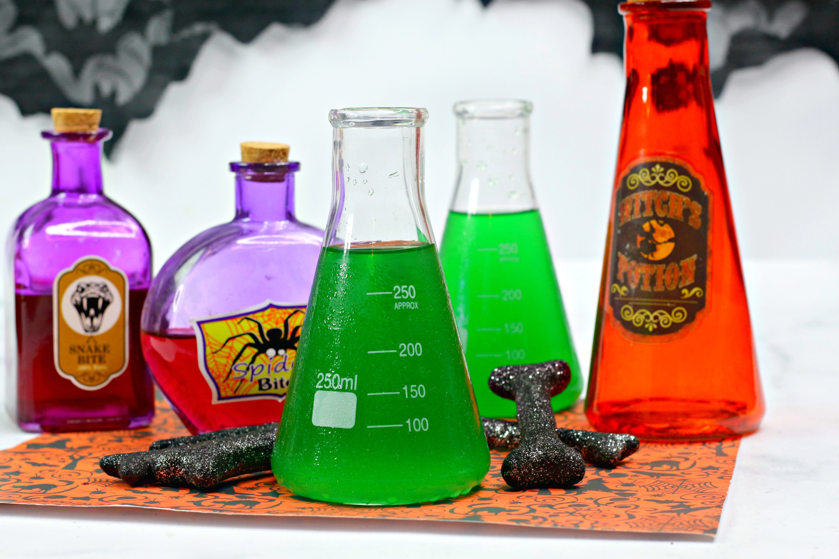 Halloween alcoholic punch served in a science flask