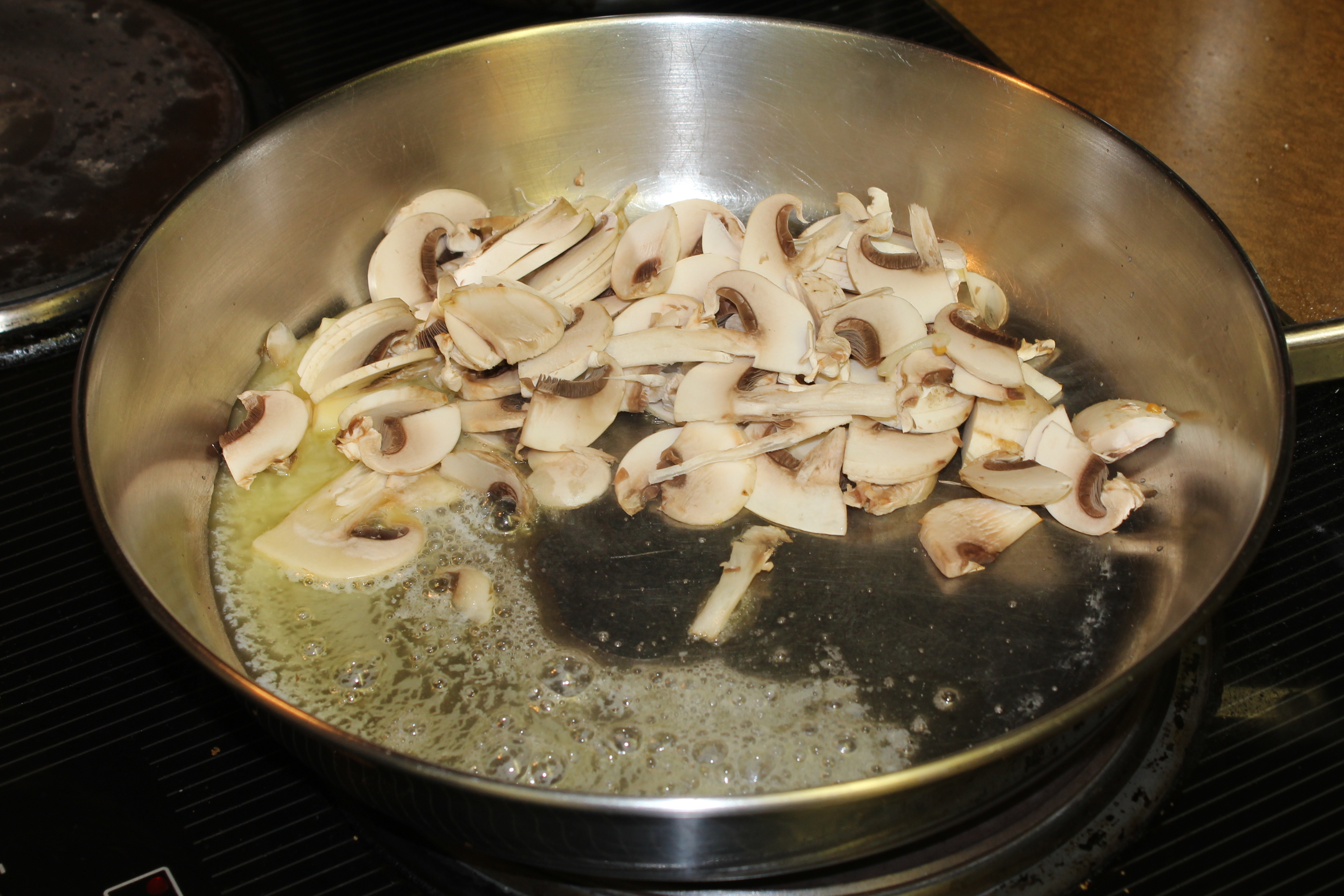 mushrooms cooking down