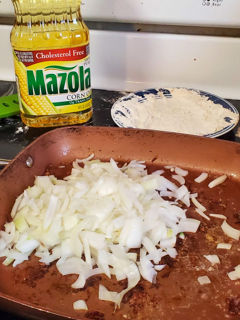 onions in a frying pan