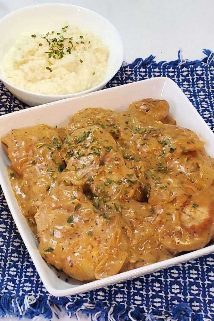 skinny smothered pork chops in a bowl