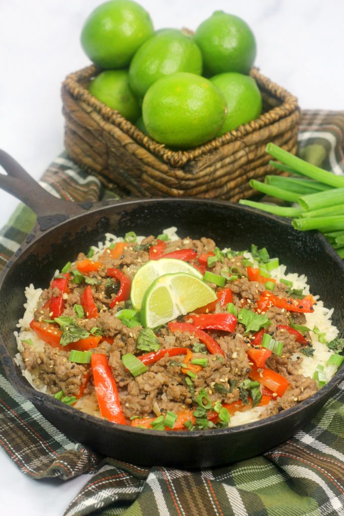 thai basil beef in a cast iron skiller