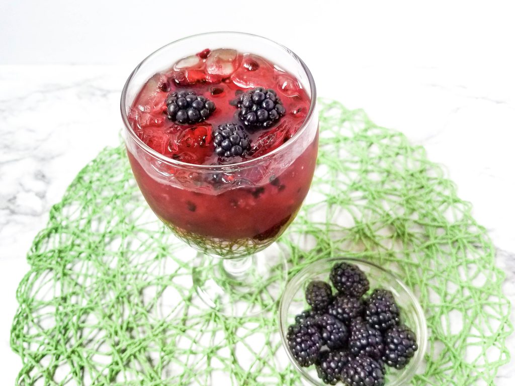 Blackberry Margaritias with blackberries on a green mat