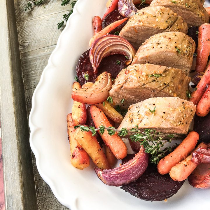 close up Orange Glazed Pork Loin with vegetables