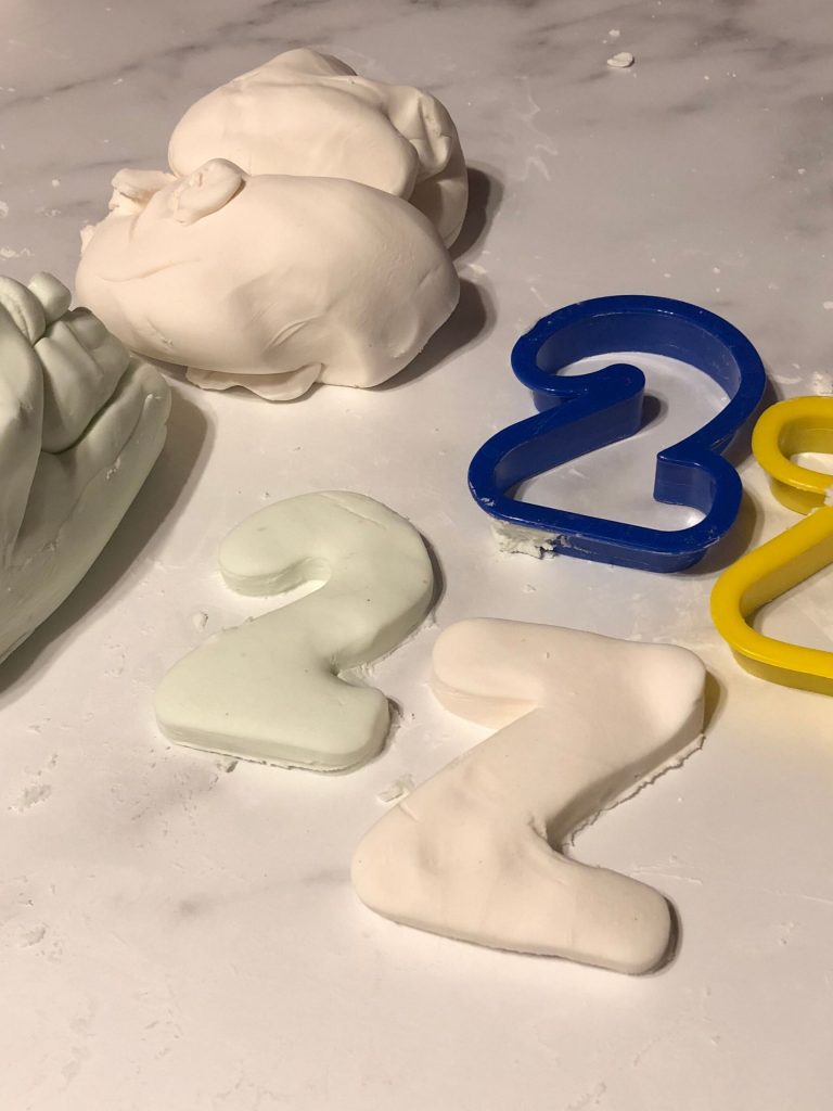 moon dough cut into numbers and letters