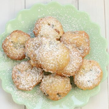 Deep-fried oreos on a mint green plate